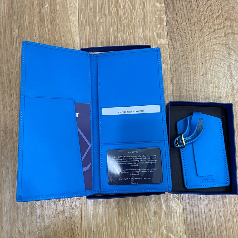 Leather travel document organizer and luggage tag.